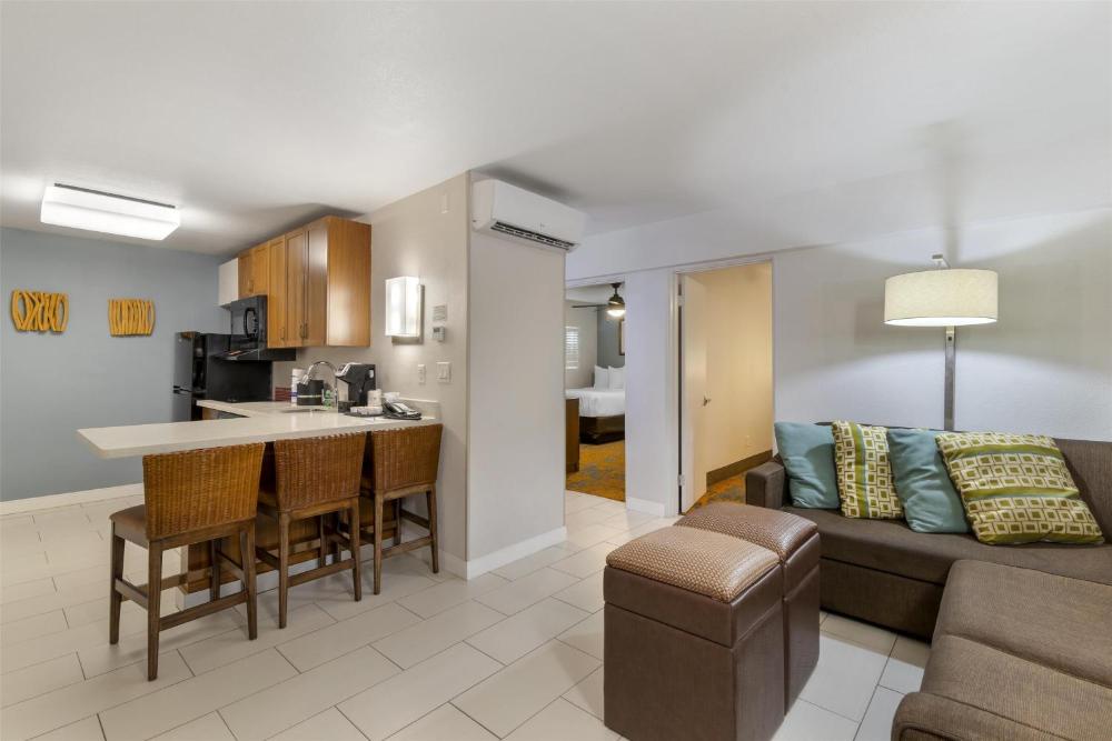 Two-Bedroom Suite with One King and Two Double Beds, Sofa Bed and Full Kitchen - Non-Smoking interior
